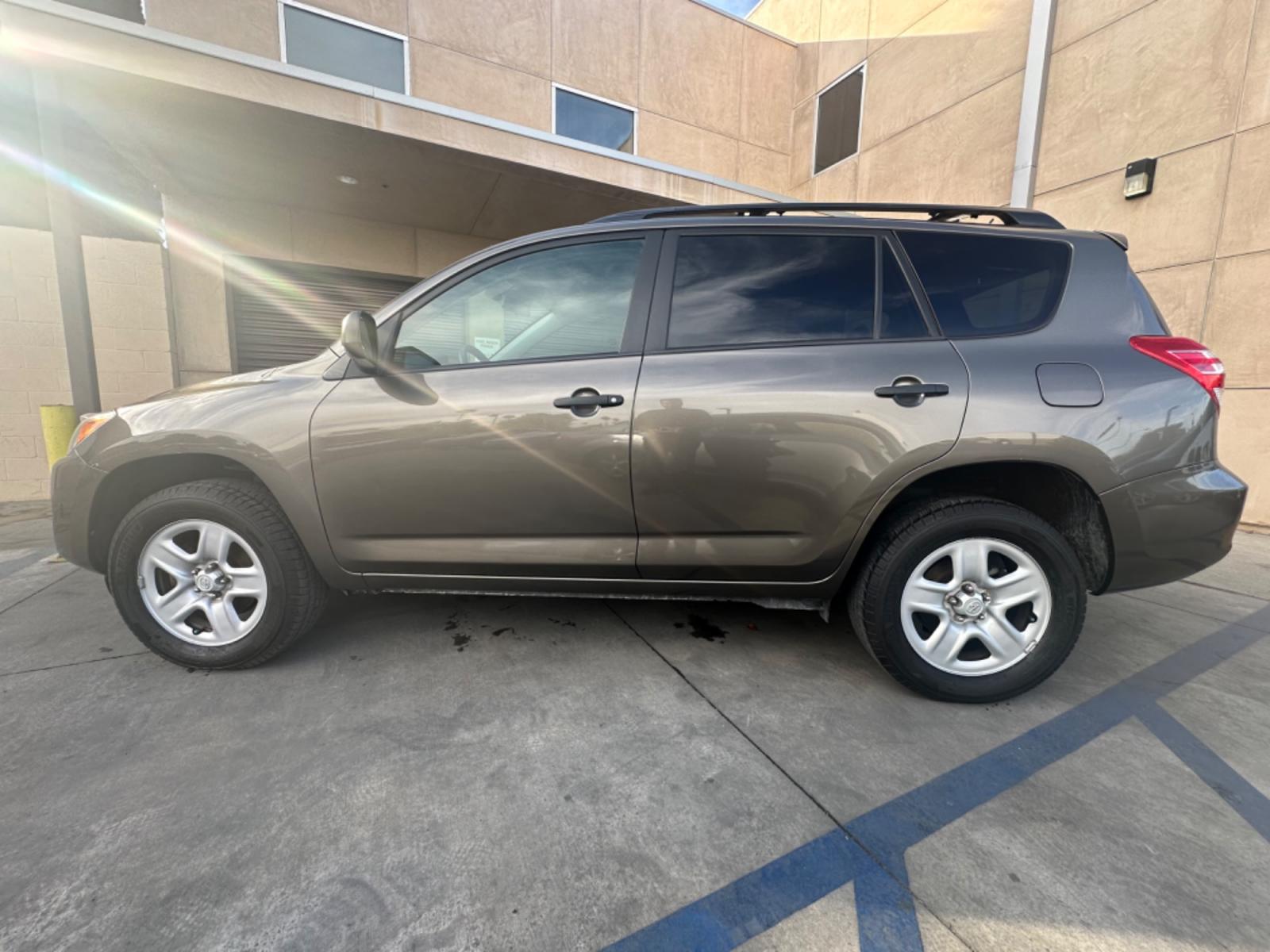 2012 Gray Toyota RAV4 Base I4 2WD with 3rd Row (2T3KF4DVXCW) with an 2.4L L4 DOHC 16V engine, 4-Speed Automatic transmission, located at 30 S. Berkeley Avenue, Pasadena, CA, 91107, (626) 248-7567, 34.145447, -118.109398 - Crown City Motors is a used “Buy Here Pay Here” car dealer in Pasadena CA. “Buy Here Pay Here” financing, means that when you purchase your vehicle from our dealership, that you make the payments to the dealership as well. We do not need the banks approval to get you approved for a used auto - Photo #2